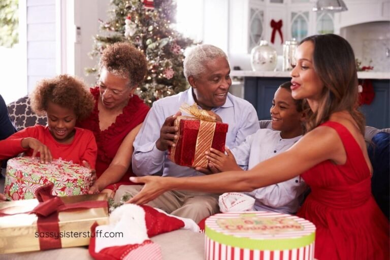 Family with grandparents, grandchildren, and adult daughter exchanging Christmas gifts.