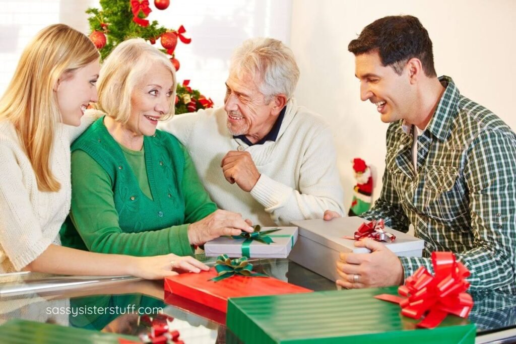 adult children and elderly parents exchange Christmas gifts.