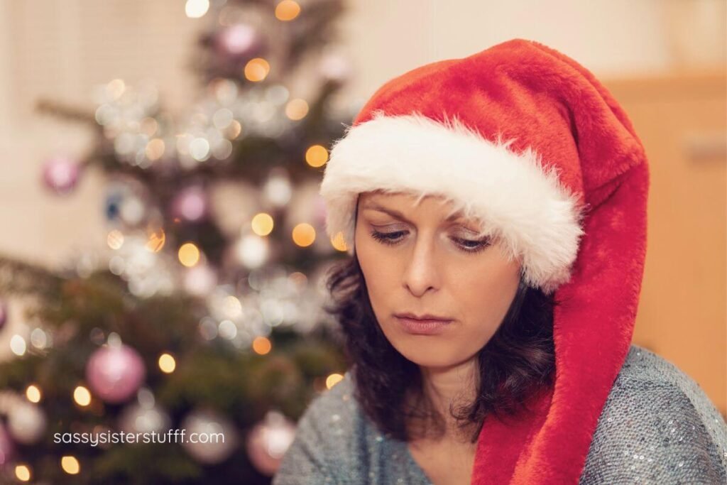 close up of midlife woman who is sad because she isn't managing stress as a caregiver during the holiday season.