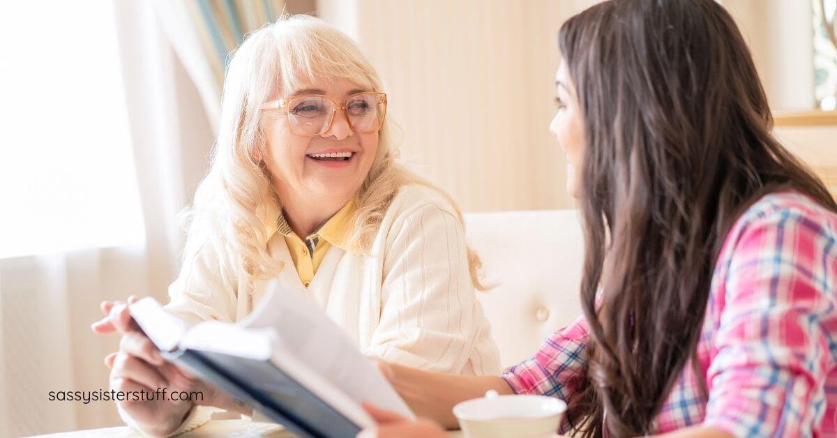 a young woman reads a book and provides caregiving for someone with dementia in peaceful setting.